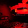 Red-lit radio for Jethro VHS spotlight