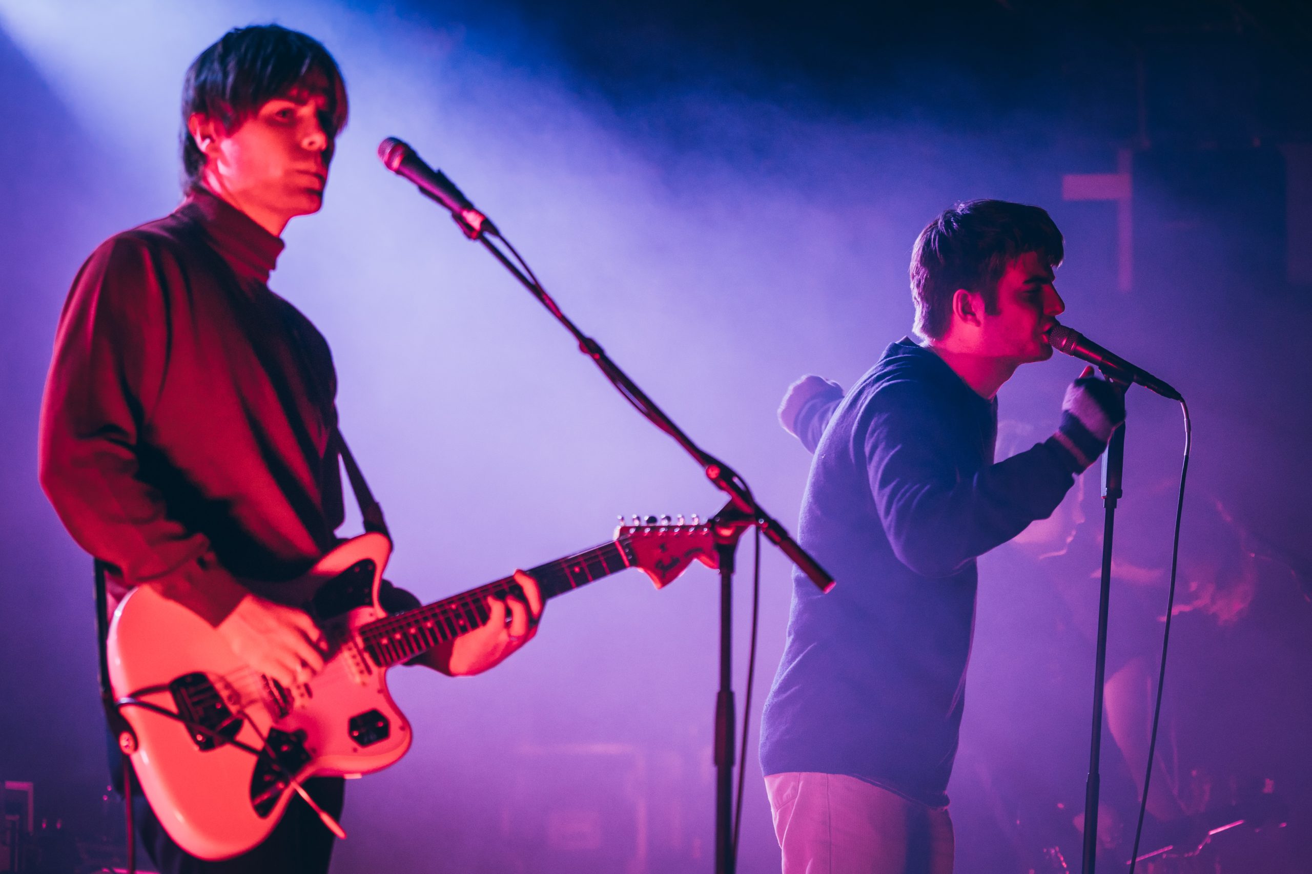An archival live-performance photograph of Fontaines D.C.