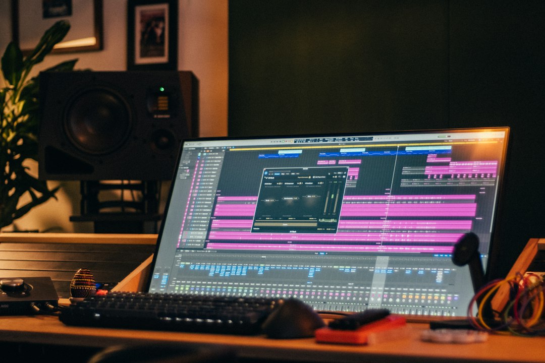 Music production studio with computer and audio equipment